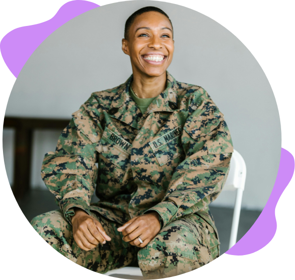 Smiling female US Marine in uniform.